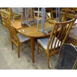 A mid-century teak extending dining table, with 2 spare leaves, L155cm extending to 265cm,