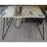 A 1950s French perforated steel magazine table, in the manner of Mathieu Mategot