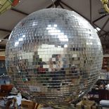 A silvered disco ball, 35cm across