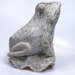A carved stone frog, 25cm