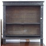 A Victorian carved oak open bookcase with adjustable shelves, W104cm, H110cm