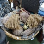 A basket containing artificial fruit, tie-backs, a pair of door knobs etc