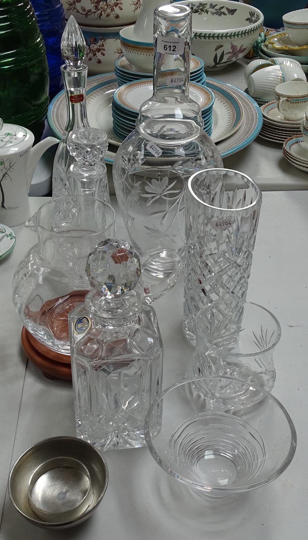 Crystal decanters, a cut-glass pot and cover etc