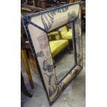 A modern cushion-framed wall mirror, W87cm