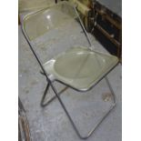 A set of 4 Castelli Plia folding chairs, by Giancario Piretti