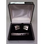 Silver and 14ct gold-mounted cufflinks and matching tie clip
