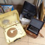 A leather-cased electric meter, a Plustron TVR5, an early portable record player etc