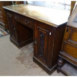 A Victorian walnut knee-hole writing desk, with single drawer, flanked by acanthus leaf carved panel