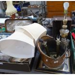 A pair of brass lamps and shades, a mirror, a tall lamp, and a cutlery tray