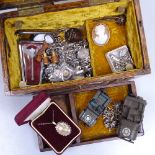 A box with miniature Corgi military vehicles, a white metal charm bracelet, miniature binoculars etc