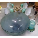 A pair of brass wall lights with iridescent glass shades, a blue glass table centre bowl etc