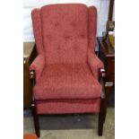 A HSL upholstered wing-back chair