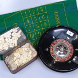 Circa 1930s roulette wheel, with bone counters