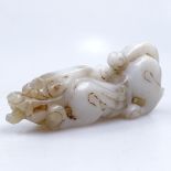 A Chinese carved jade animal, 11cm