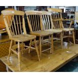 A mixed harlequin set of 7 pine and elm-seated kitchen chairs, including elbow chair