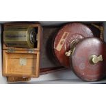An Antique brass Surveyor's instrument, drawing instruments, Surveyor's tapes, and a case of brass