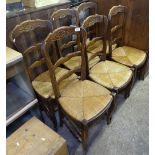 A set of 6 French oak ladder-back rush-seated dining chairs