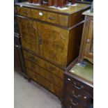A 1930s walnut tall boy, with fitted cupboard and drawers, W75cm, H130cm