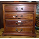 A small hardwood 4-drawer music cabinet, W53cm