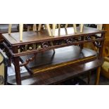 A Chinese rosewood rectangular coffee table, with carved and pierced frieze, L127cm