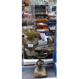 A brass oil lamp with chimney, height 50cm