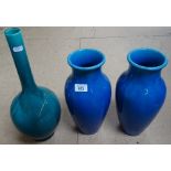 A pair of Chinese blue glazed vases, and a bottle vase, 41cm