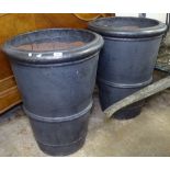 A pair of black glazed terracotta garden plant pots, H70cm