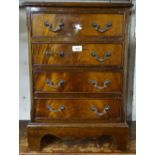 A reproduction mahogany 4-drawer chest of small size