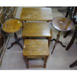 A rectangular oak nest of 3 tables, and a pair of reproduction mahogany wine tables
