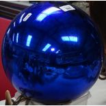 A blue glass witch's ball, 22cm