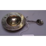 A Russian silver and silver-gilt tea strainer stamped 84