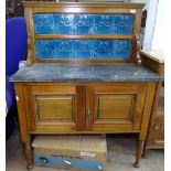 An Edwardian walnut tile-back and marble-top washstand, with cupboards under, on turned legs, W91cm
