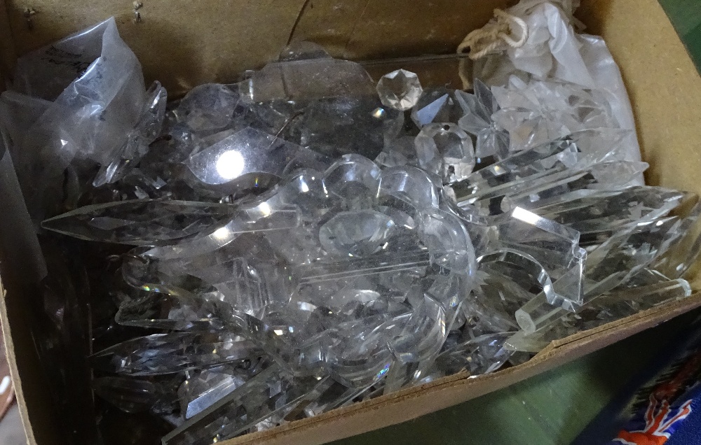A box of cut-glass lustres