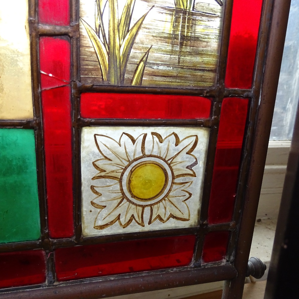 A Victorian brass and stained glass firescreen, with inset leadlight panels depicting birds and - Image 5 of 9