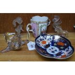 A pair of figures, Villeroy and Boch seal etc