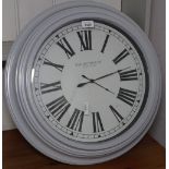 A modern quartz wall clock, W55cm