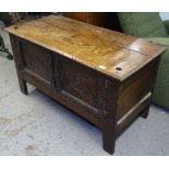 A Victorian oak cabinet with 2 carved panelled doors, W108cm, H60cm