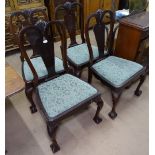 A set of 4 mahogany Queen Anne style dining chairs with upholstered drop-in seats, raised on