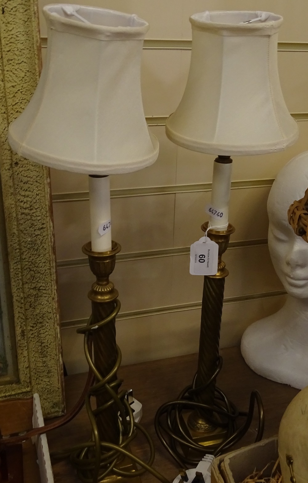 A pair of brass twist table lamps with shades, 53cm overall