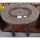 An Antique mahogany extending bookrack, and a chip carved stool with oval top, length 37cm