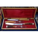 A Victorian horn-handled 4-piece carving set, in silk-lined fitted case, Harrison Brothers and