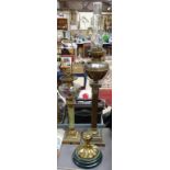 A brass oil lamp with fluted column with chimney, 91cm, dolphin lamp, and a brass lamp base and