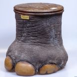 An elephant's foot made into a container with 4 sections and cover, inscribed Gum Gum River