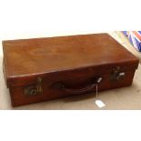 A Vintage leather suitcase with brass locks, length 59cm