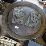 A wooden dish, 52cm, and a pair of carved lion masks