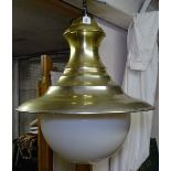 A pair of large modern brass-effect lanterns