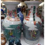 A pair of Chinese porcelain vases with painted figures, 47cm