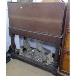 A 1920s oak record cabinet on stand, and a quantity of 78 records