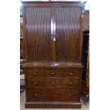 An Antique mahogany 2-section bookcase, the top having tambour fitted doors with adjustable shelves,