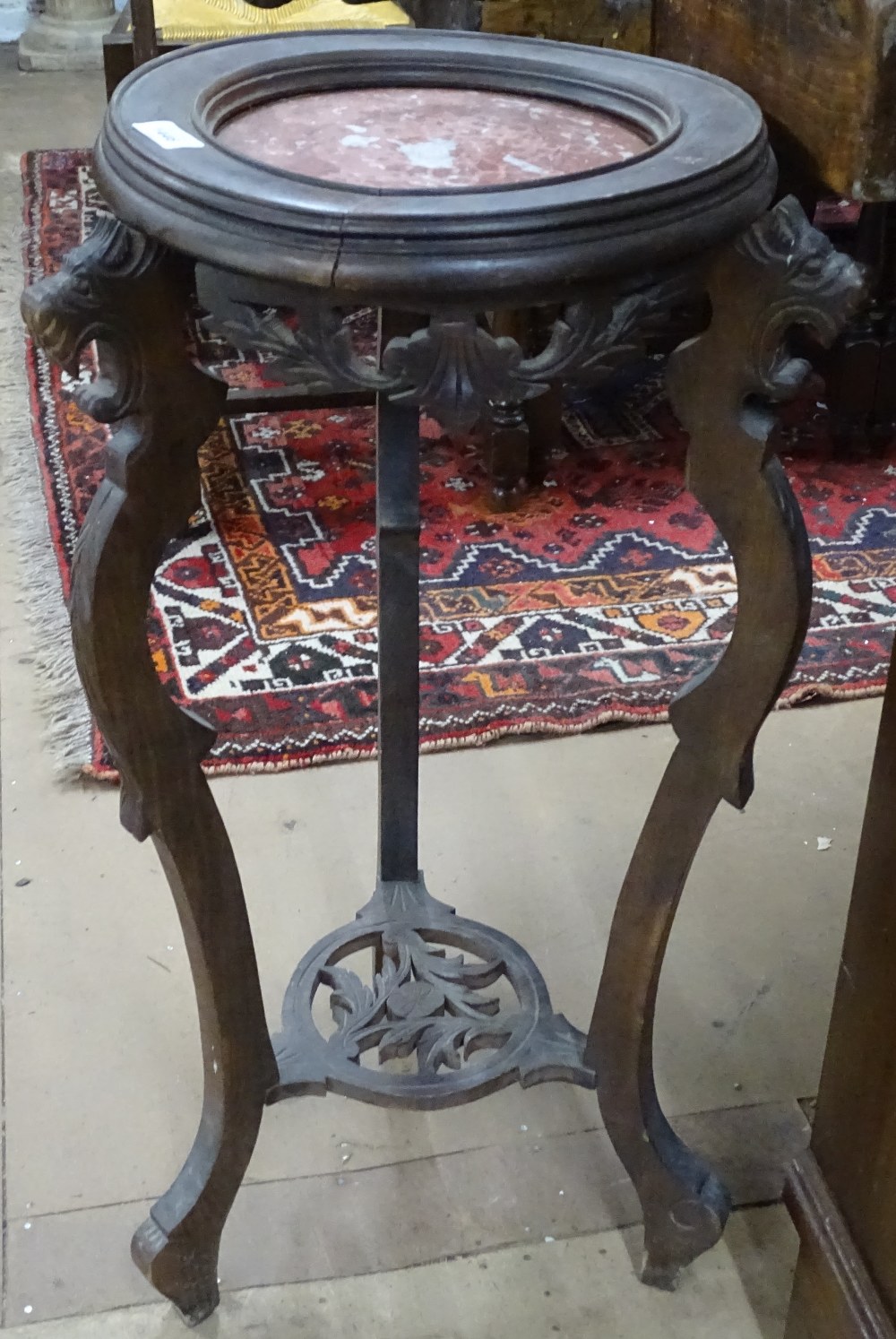 A French oak and marble-top jardiniere stand